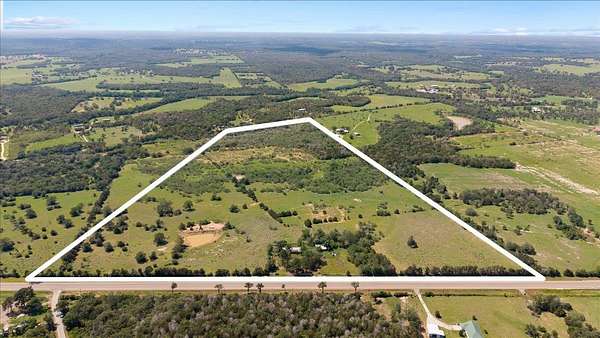70.9 Acres of Land with Home for Sale in Rosanky, Texas