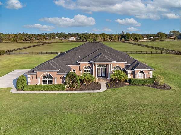 5.12 Acres of Land with Home for Sale in Tavares, Florida