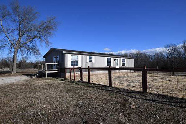 6.2 Acres of Residential Land with Home for Sale in Burlington, Kansas