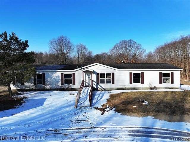 11.6 Acres of Land with Home for Sale in Wales Township, Michigan