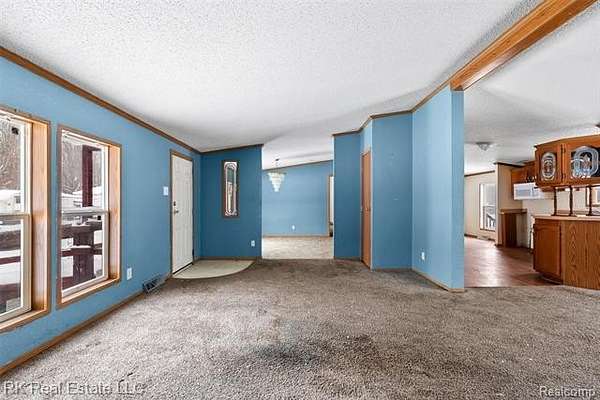 8 Acres of Residential Land with Home for Sale in Wales Township, Michigan