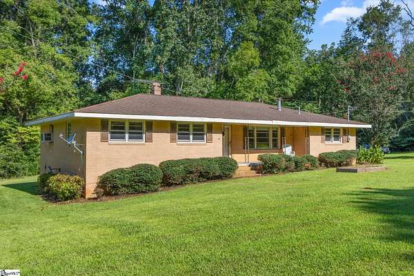 9 Acres of Land with Home for Sale in Clinton, South Carolina