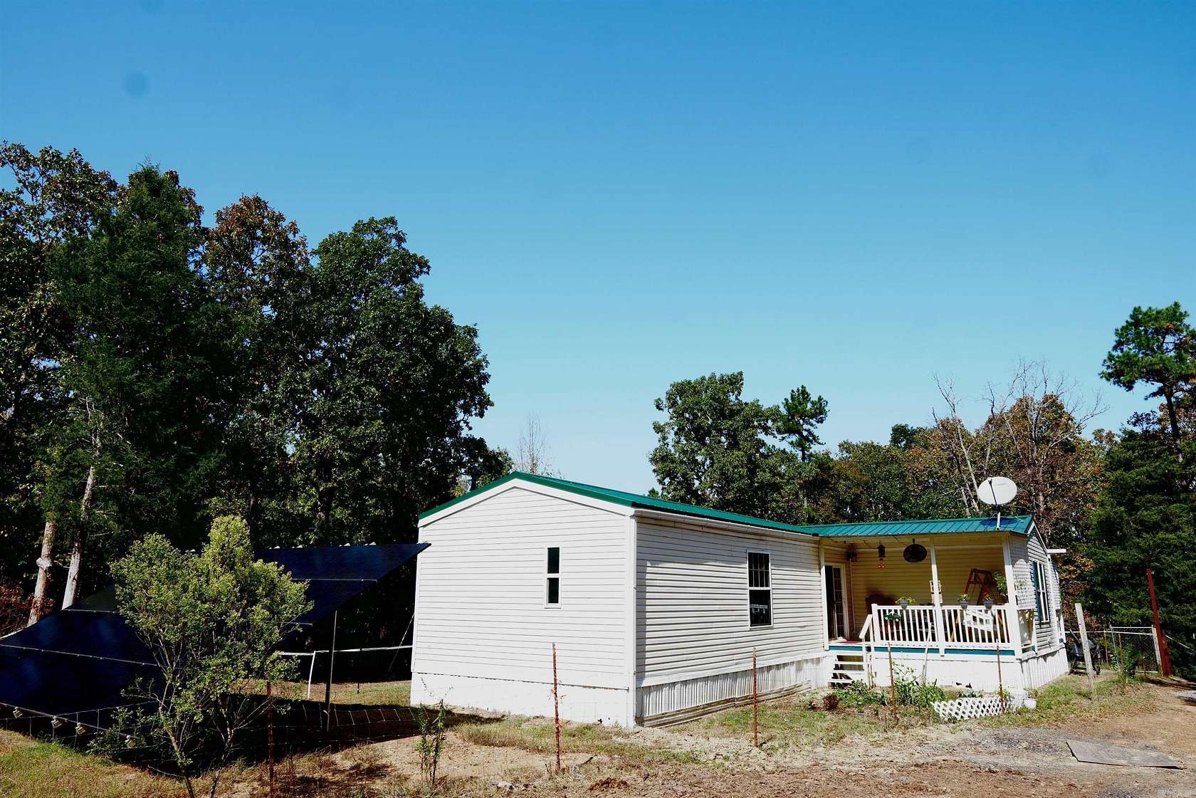 4.37 Acres of Residential Land with Home for Sale in Boles, Arkansas