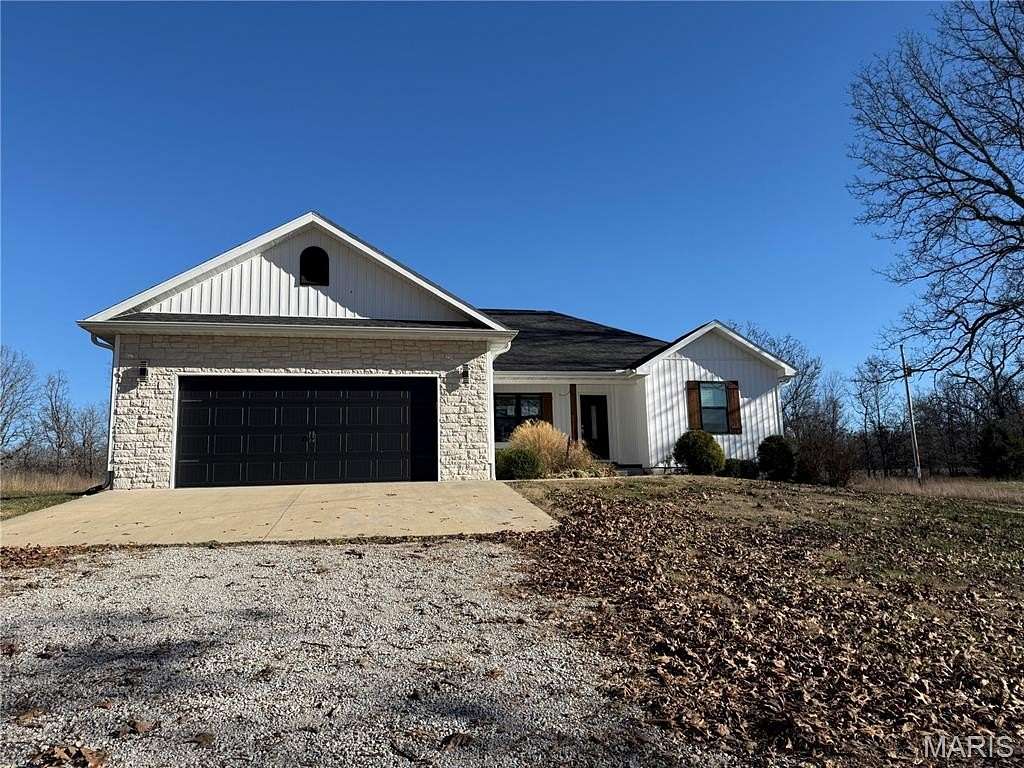 3 Acres of Residential Land with Home for Sale in Pomona, Missouri