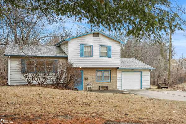 2.35 Acres of Land with Home for Sale in Knoxville, Iowa