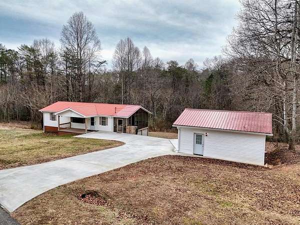 1.5 Acres of Residential Land with Home for Sale in McCaysville, Georgia