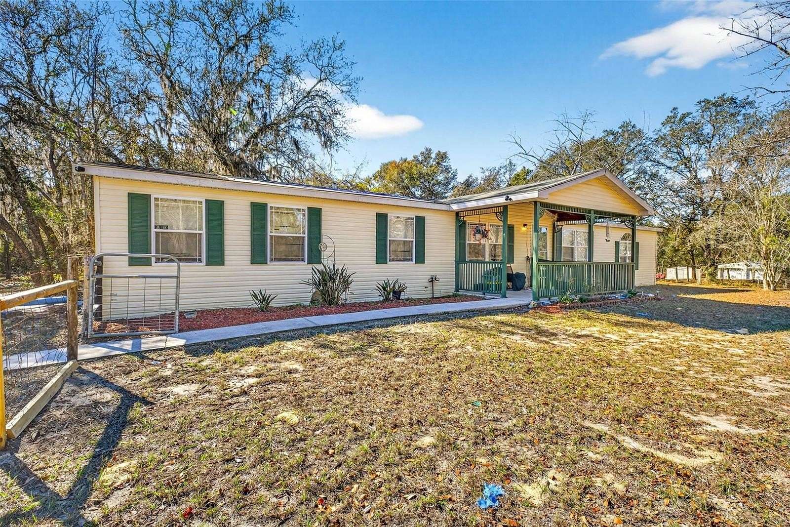 2.44 Acres of Residential Land with Home for Sale in Spring Hill, Florida