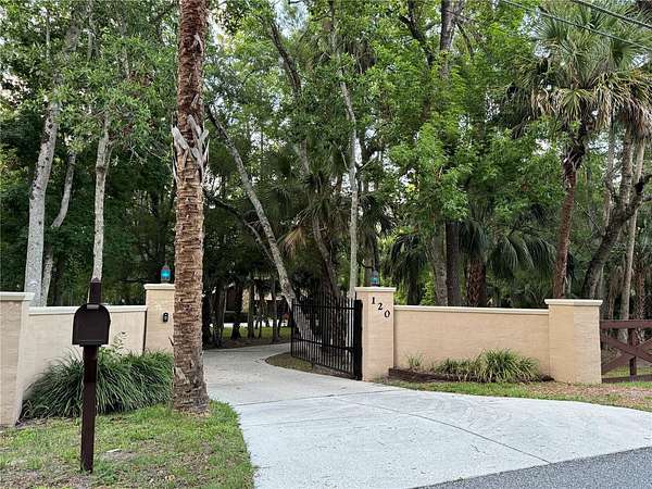 2.22 Acres of Residential Land with Home for Sale in Winter Springs, Florida