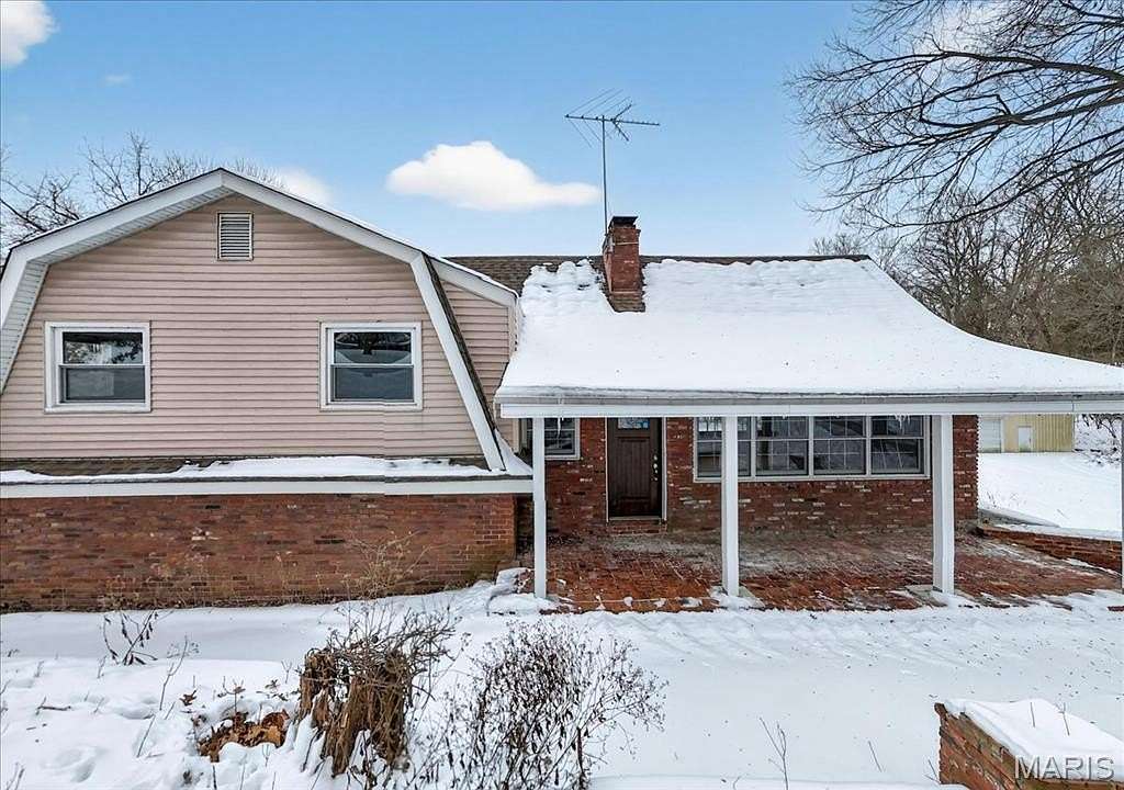 1.55 Acres of Residential Land with Home for Sale in Florissant, Missouri