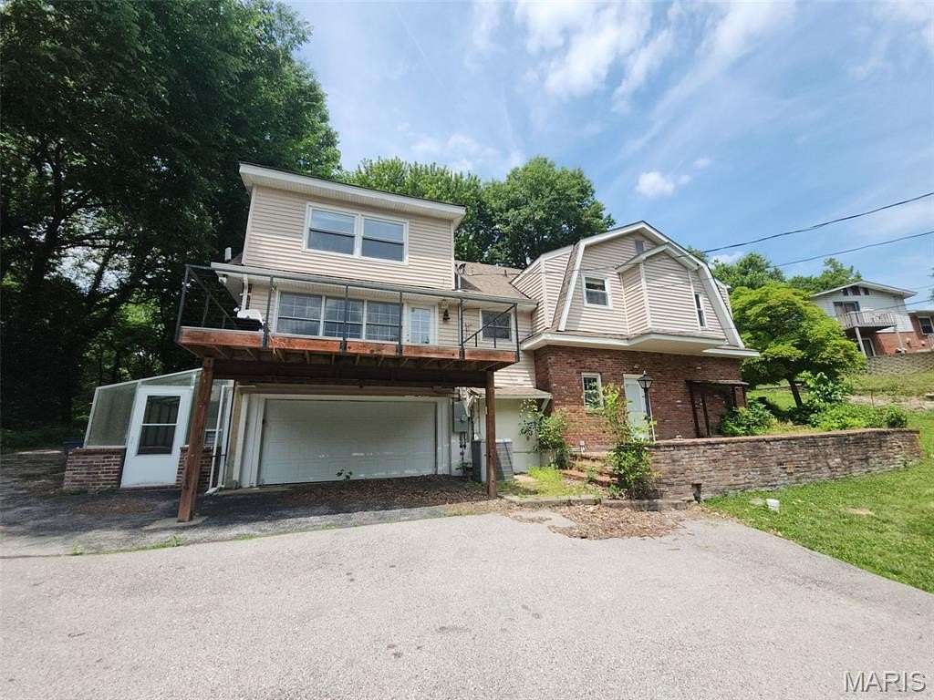 1.55 Acres of Land with Home for Sale in Florissant, Missouri