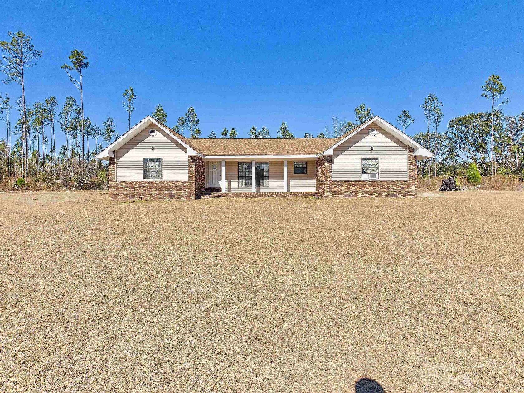 9 Acres of Residential Land with Home for Sale in Perry, Florida