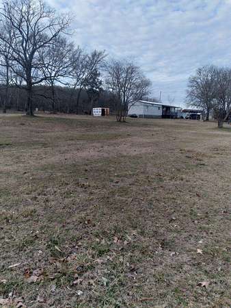 1.69 Acres of Land with Home for Sale in Prairie Grove, Arkansas