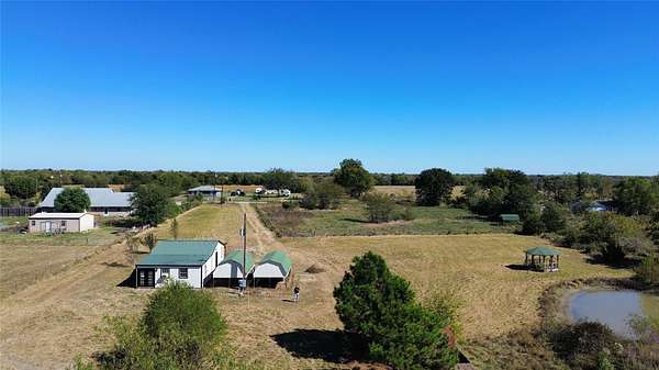 6.79 Acres of Land with Home for Sale in Pattonville, Texas
