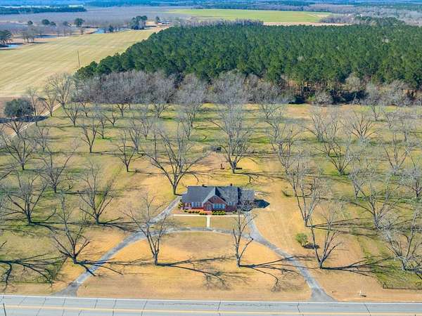 23.9 Acres of Agricultural Land with Home for Sale in Vienna, Georgia