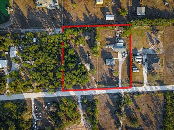 2.5 Acres of Residential Land with Home for Sale in Punta Gorda, Florida