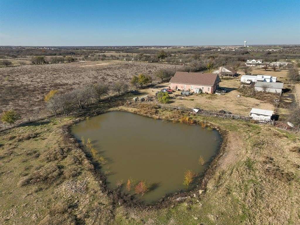 10 Acres of Land with Home for Sale in Justin, Texas