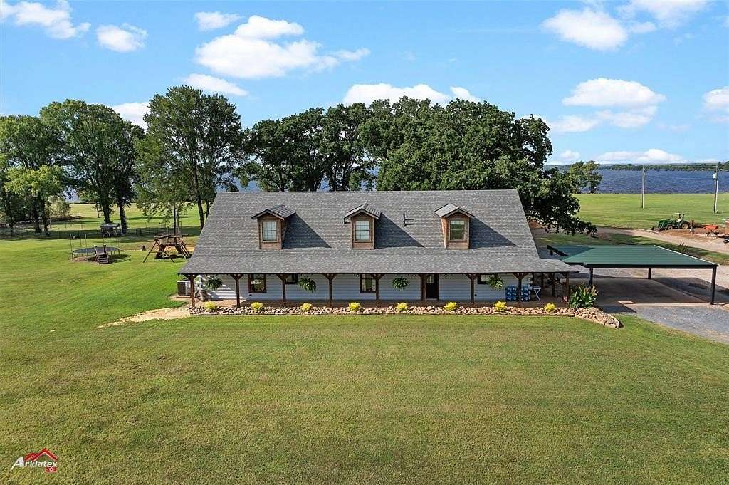 11.6 Acres of Land with Home for Sale in Oil City, Louisiana