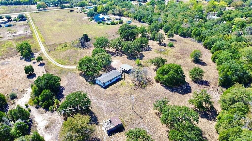 6.5 Acres of Residential Land with Home for Sale in Elgin, Texas