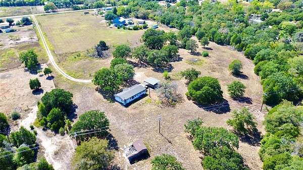 6.5 Acres of Residential Land with Home for Sale in Elgin, Texas
