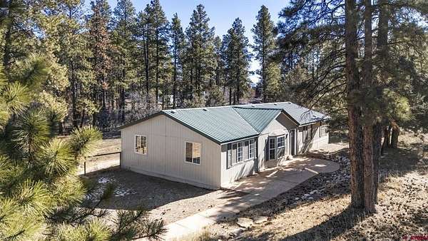 8 Acres of Land with Home for Sale in Mancos, Colorado