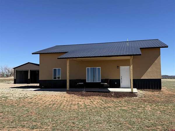 4.67 Acres of Land with Home for Sale in Mancos, Colorado