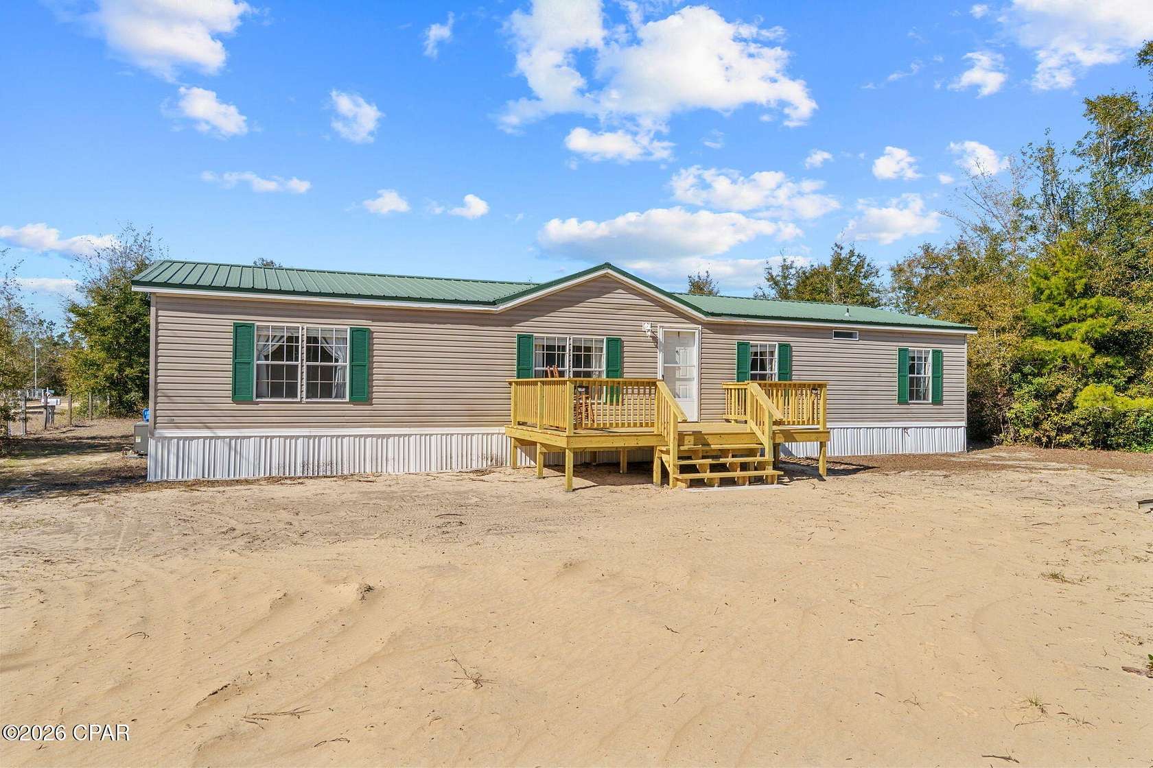 4 Acres of Residential Land with Home for Sale in Youngstown, Florida