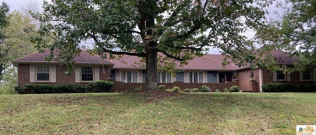 10.7 Acres of Land with Home for Sale in Tompkinsville, Kentucky