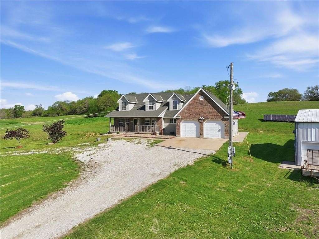 14.6 Acres of Land with Home for Sale in Drexel, Missouri