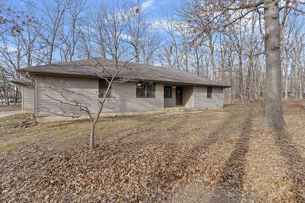 11.1 Acres of Land with Home for Sale in Strafford, Missouri