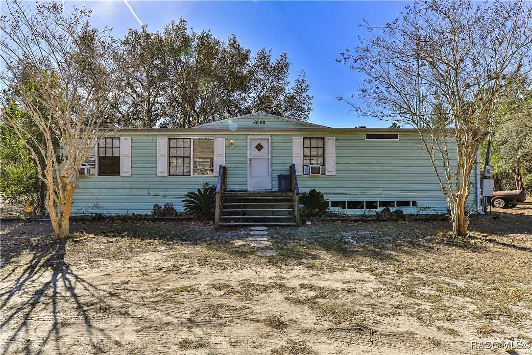 2.64 Acres of Residential Land with Home for Sale in Dunnellon, Florida