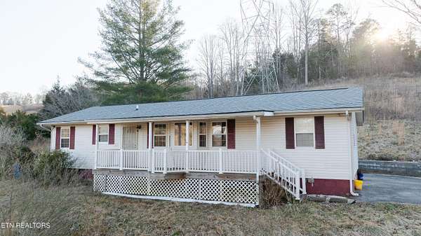 6.55 Acres of Residential Land with Home for Sale in Rocky Top, Tennessee