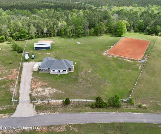 8.15 Acres of Land with Home for Sale in Carriere, Mississippi