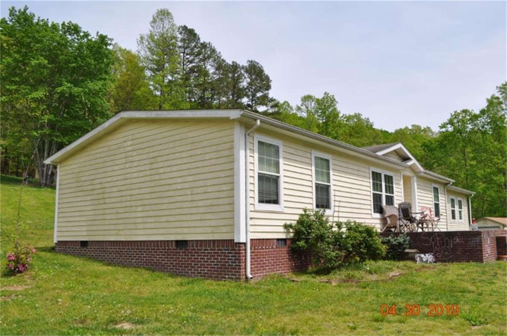 12.6 Acres of Land with Home for Sale in Somerset, Kentucky