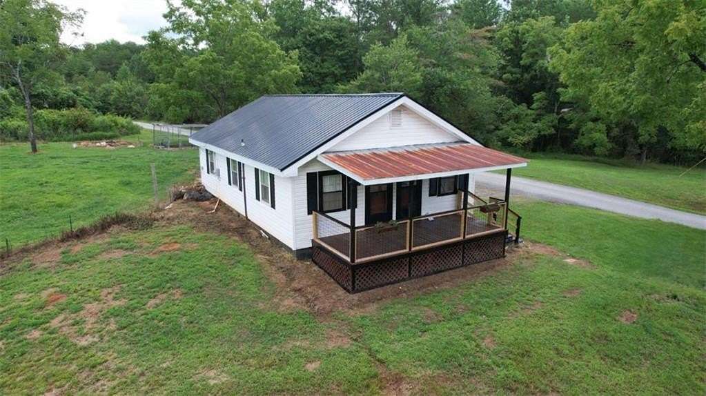 5.23 Acres of Land with Home for Sale in Marblehill, Georgia
