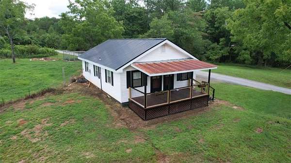 5.23 Acres of Land with Home for Sale in Marblehill, Georgia