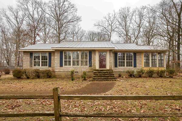 9.3 Acres of Land with Home for Sale in Florence, Alabama