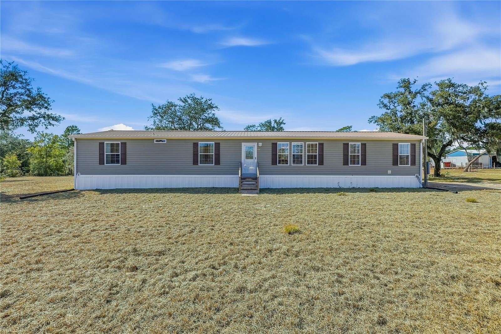 5 Acres of Land with Home for Sale in Bronson, Florida