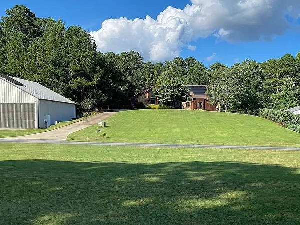 2.39 Acres of Residential Land with Home for Sale in Cumming, Georgia