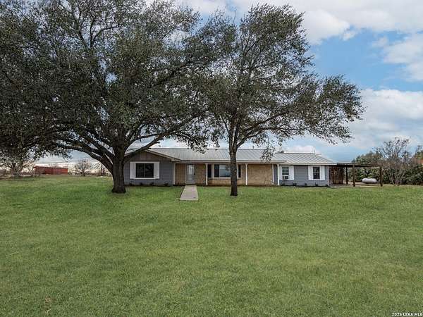 12.1 Acres of Land with Home for Sale in Von Ormy, Texas