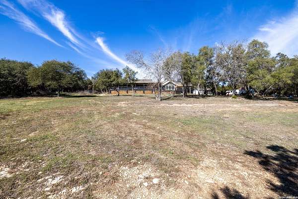 8 Acres of Residential Land with Home for Sale in Canyon Lake, Texas