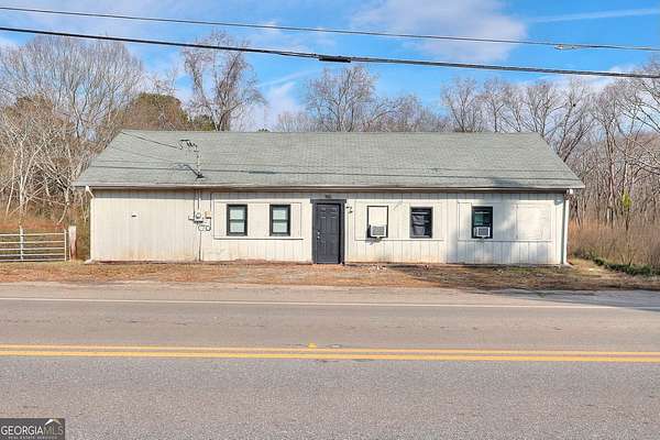 6.6 Acres of Residential Land with Home for Sale in Cumming, Georgia