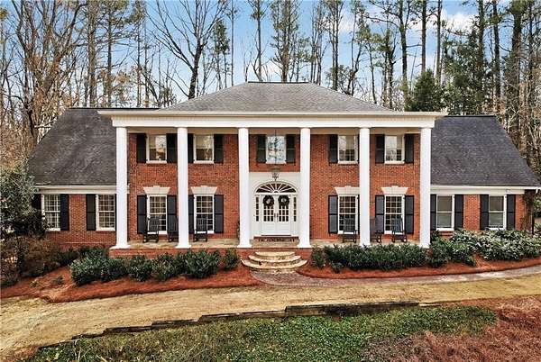 2.5 Acres of Residential Land with Home for Sale in Sandy Springs, Georgia