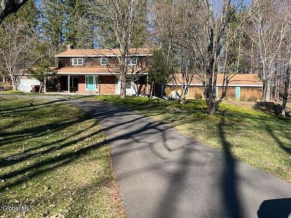 2.87 Acres of Land with Home for Sale in West Sand Lake, New York