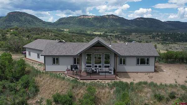3.1 Acres of Residential Land with Home for Sale in Pagosa Springs, Colorado