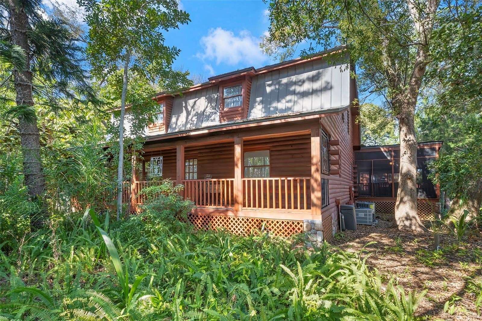 1.75 Acres of Residential Land with Home for Sale in Palm Harbor, Florida