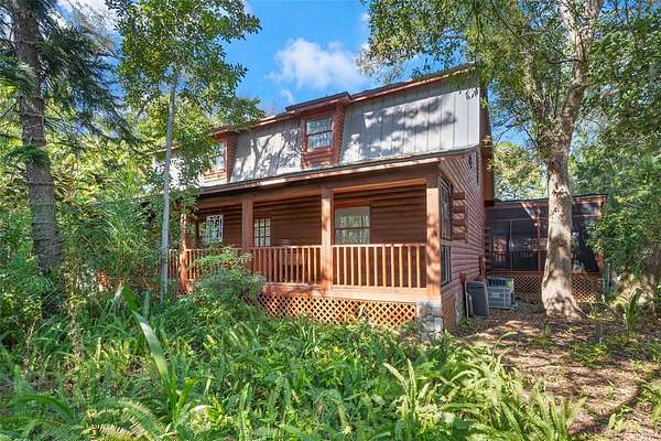 1.75 Acres of Residential Land with Home for Sale in Palm Harbor, Florida