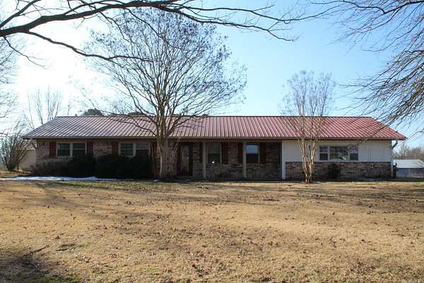 16.6 Acres of Land with Home for Sale in Umpire, Arkansas