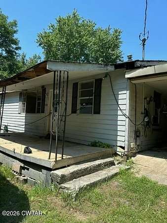 7.78 Acres of Residential Land with Home for Sale in Dyersburg, Tennessee