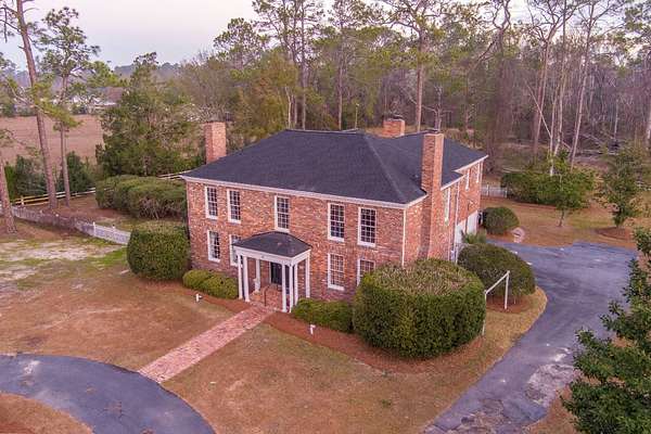 2.42 Acres of Residential Land with Home for Auction in Homerville, Georgia