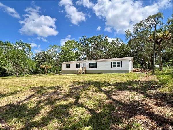 1.6 Acres of Land with Home for Sale in Brooksville, Florida